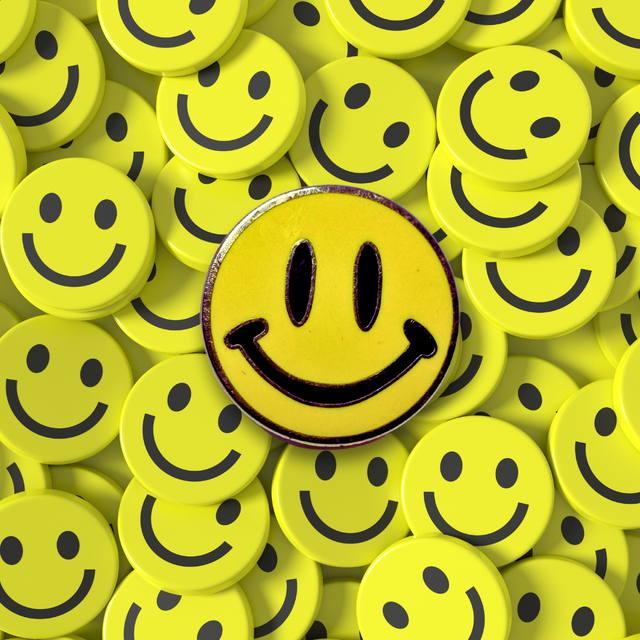 Smiley face pin